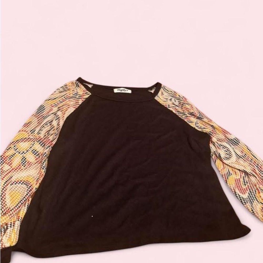 Elegant Black Blouse with Patterned Sleeves